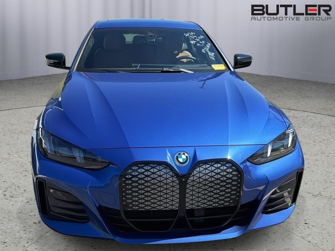 Used 2025 Portimao Blue Metallic BMW eDrive40 image 4