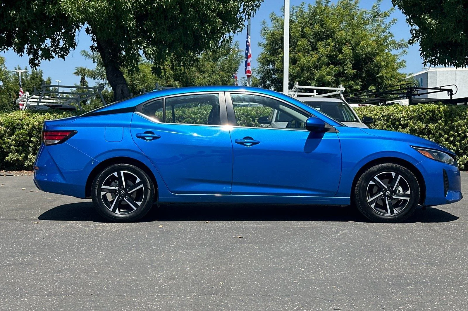 Used 2025 Electric Blue Metallic Nissan SV image 3