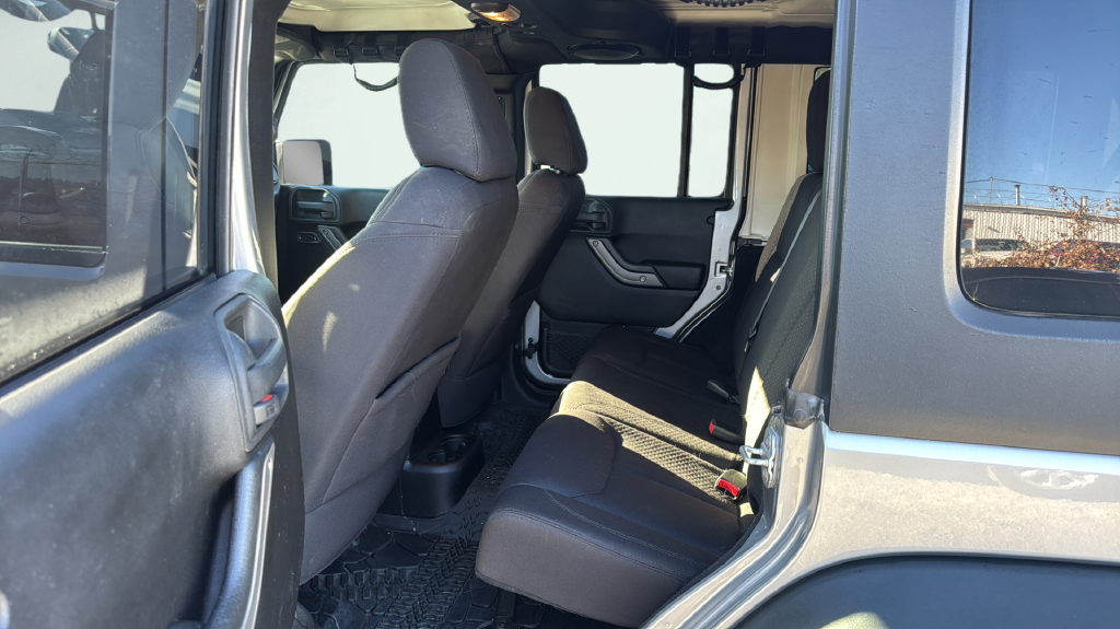 Used 2013 Silver Jeep Unlimited Sport image 15