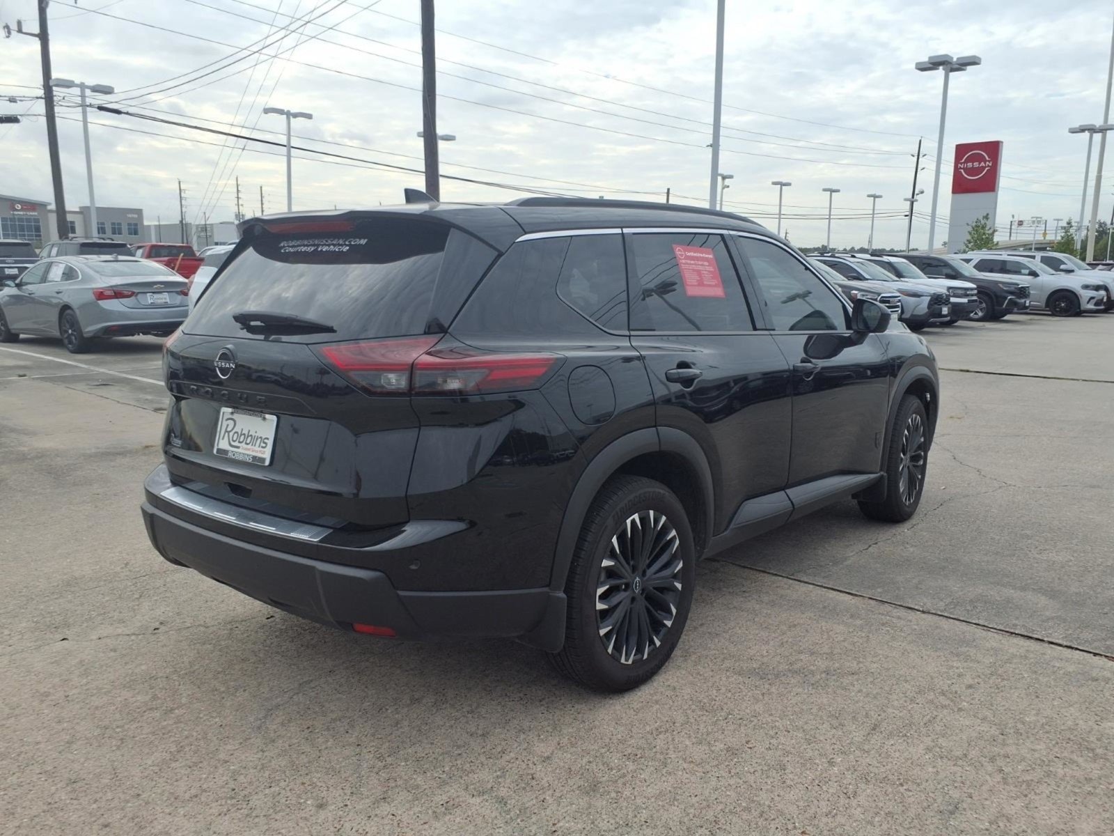 Certified Used 2026 Super Black Nissan Dark Armor image 2