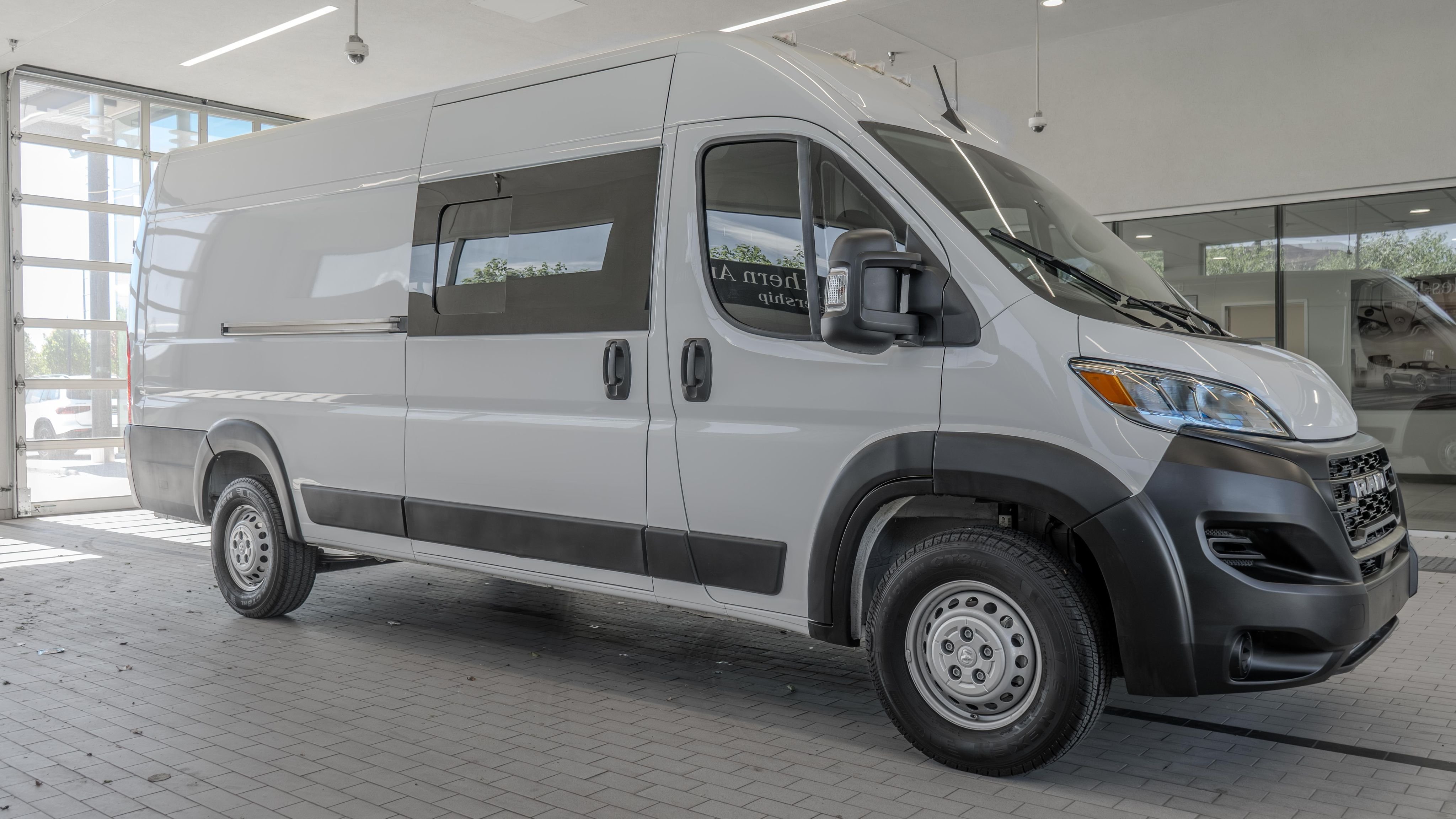 Used 2024 Bright White Clearcoat Ram High Roof image 12