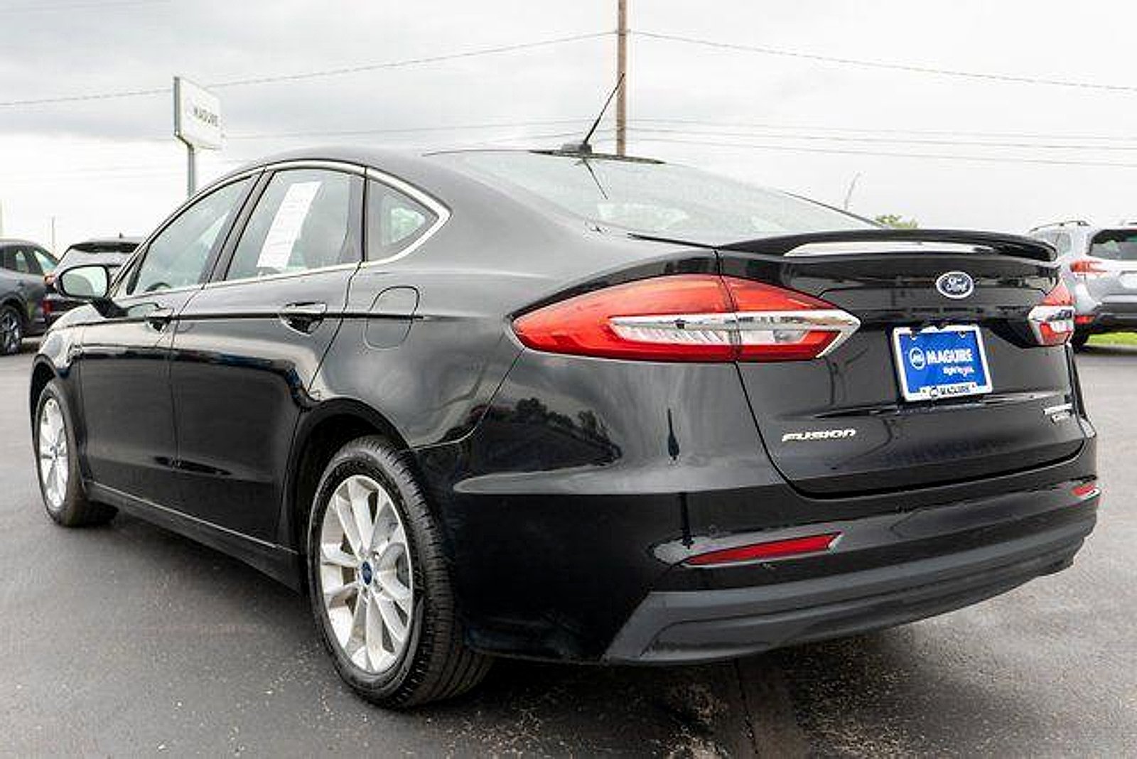 Used 2020 Agate Black Metallic Ford Plug-In Hybrid Titanium image 8