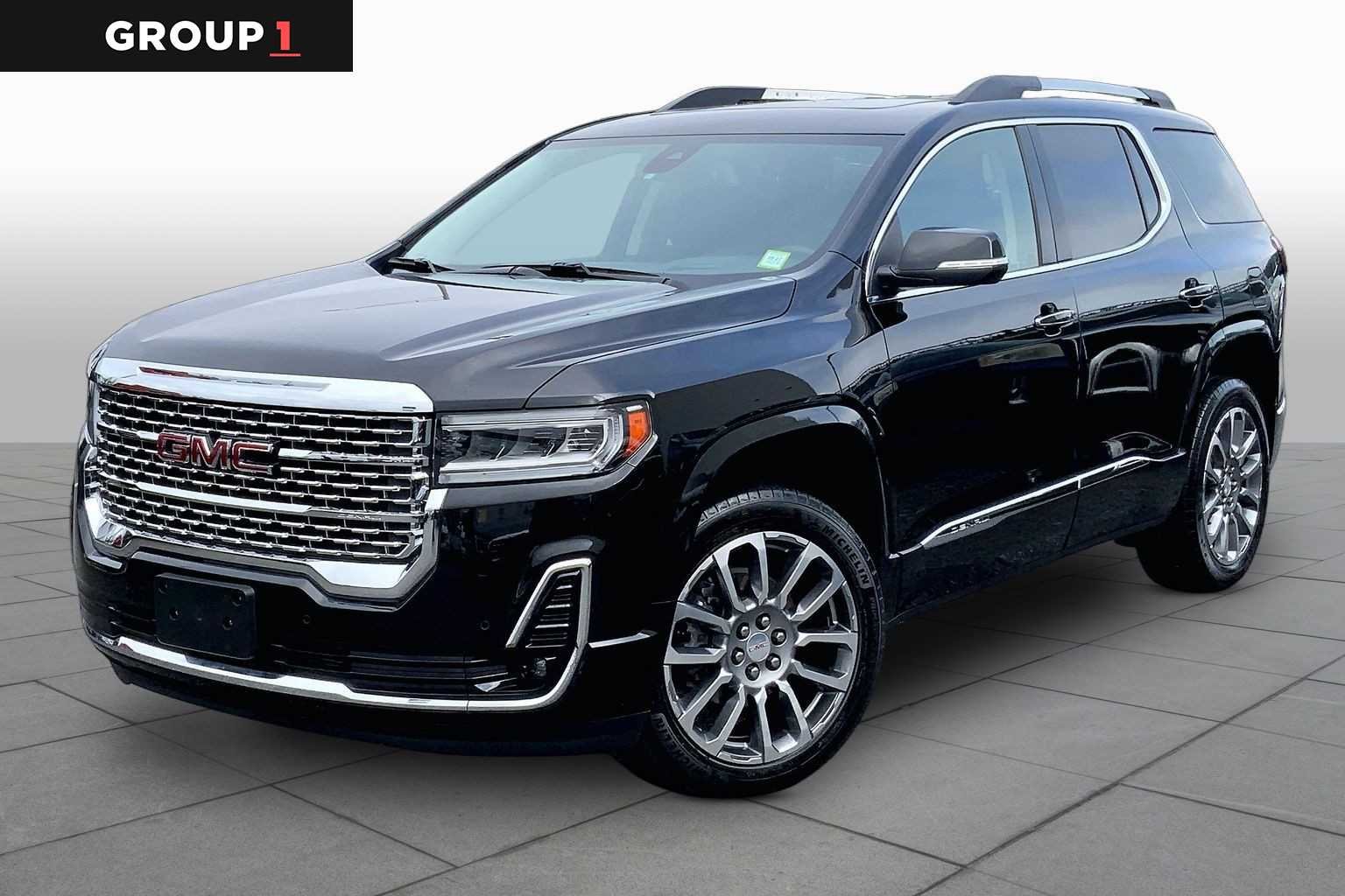 Used 2023 EBONY TWILIGHT METALLIC GMC Denali image 1