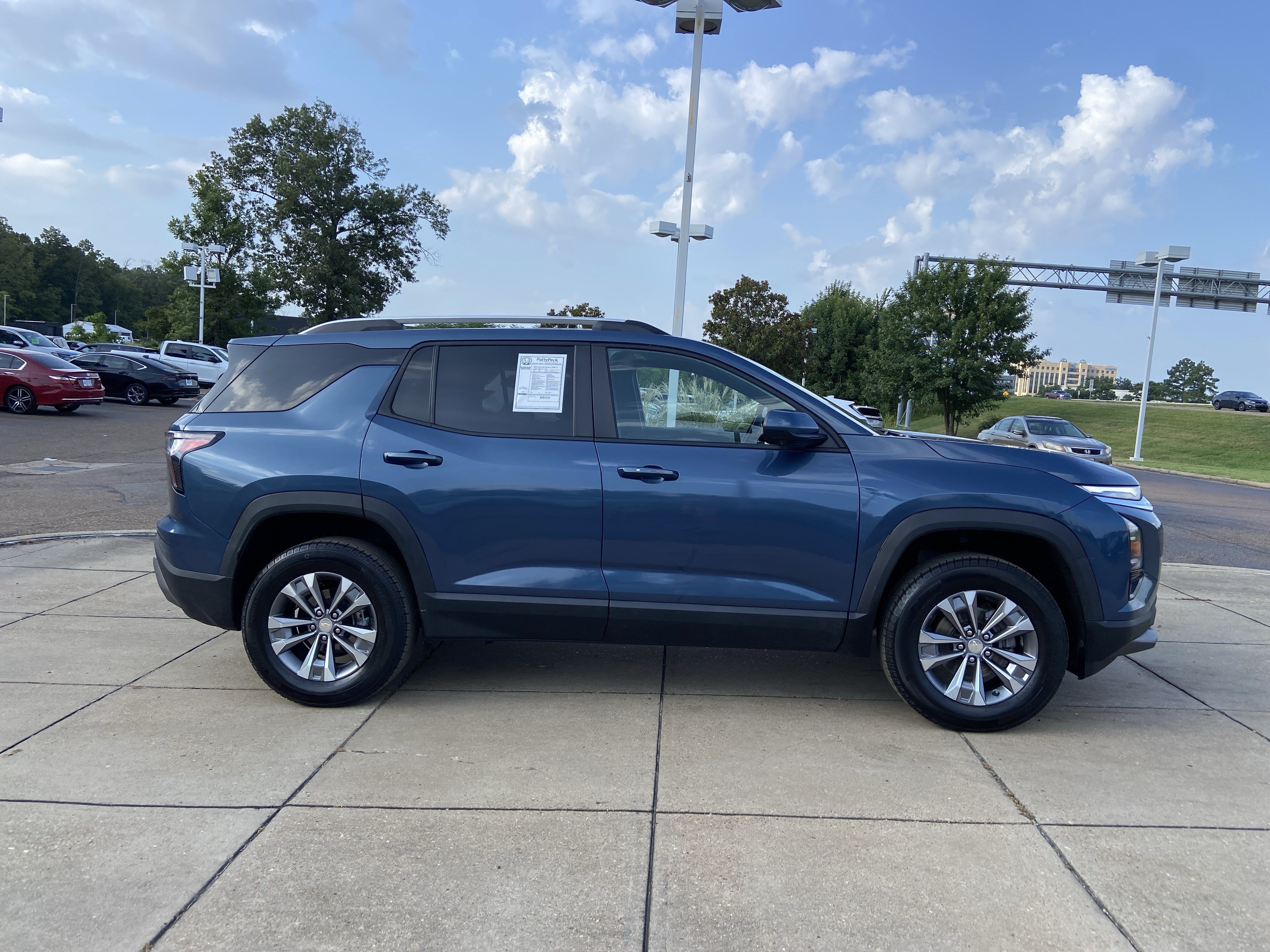 Used 2025 Lakeshore Blue Metallic Chevrolet AWD LT image 14