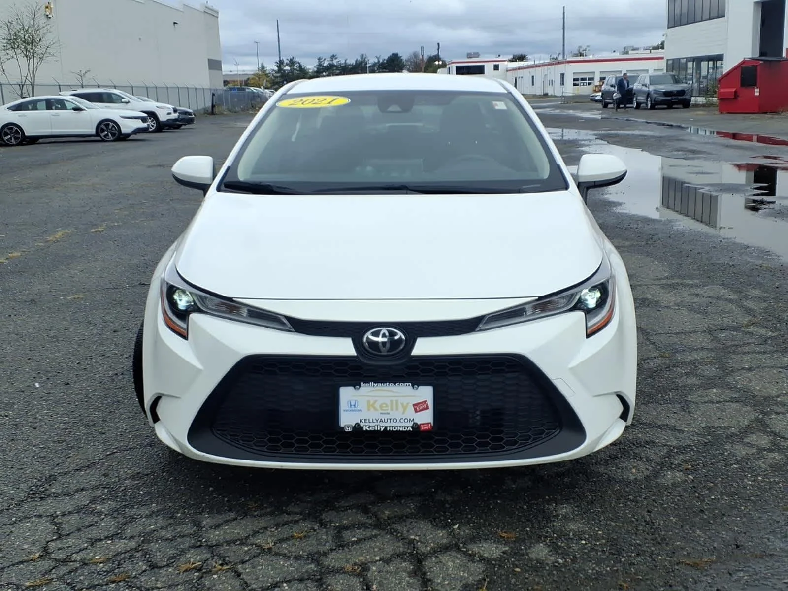 Used 2021 Super White Toyota LE image 2
