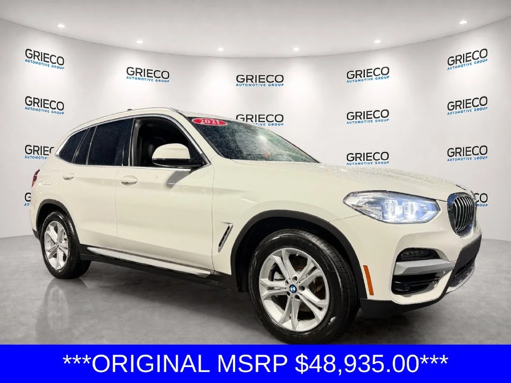 Used 2021 White BMW xDrive30i image 1