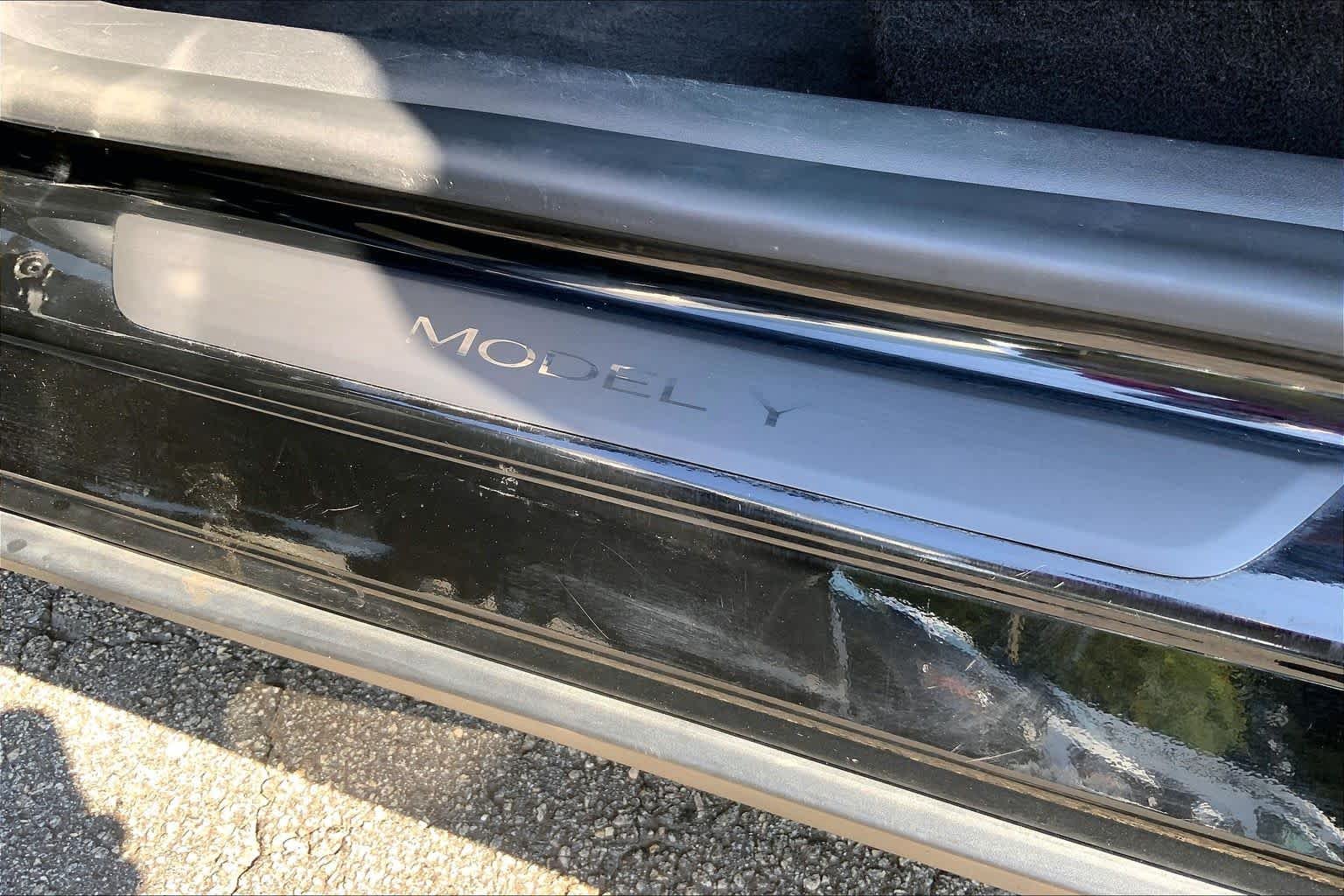 Used 2021 Solid Black Tesla Performance image 9