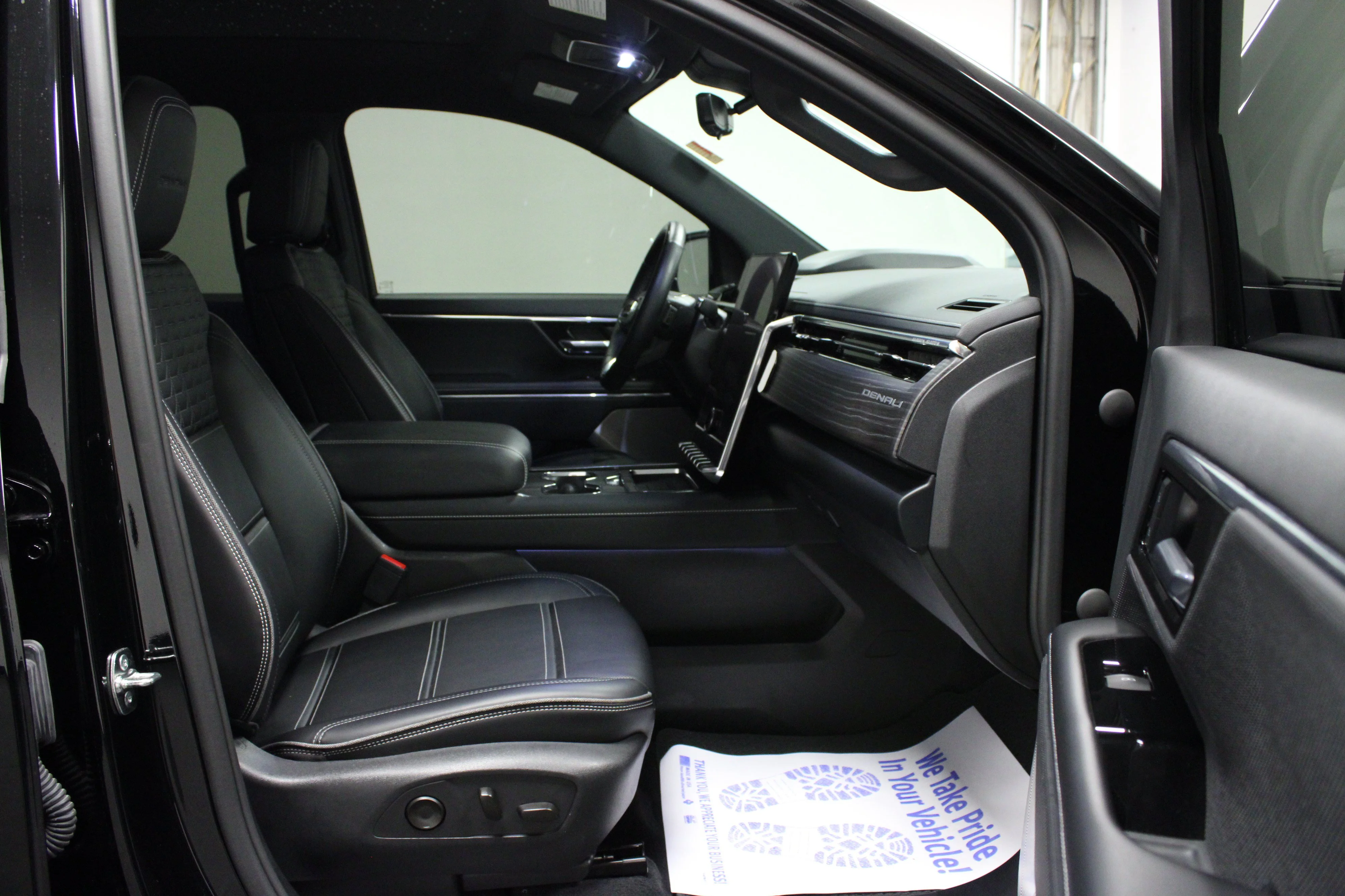 Used 2025 Onyx Black GMC Max Range Denali image 16
