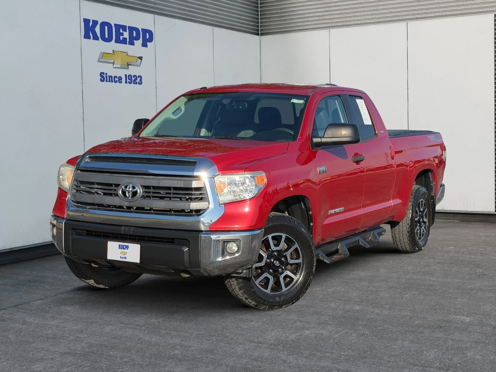 Used 2015 Barcelona Red Metallic Toyota SR5 image 1