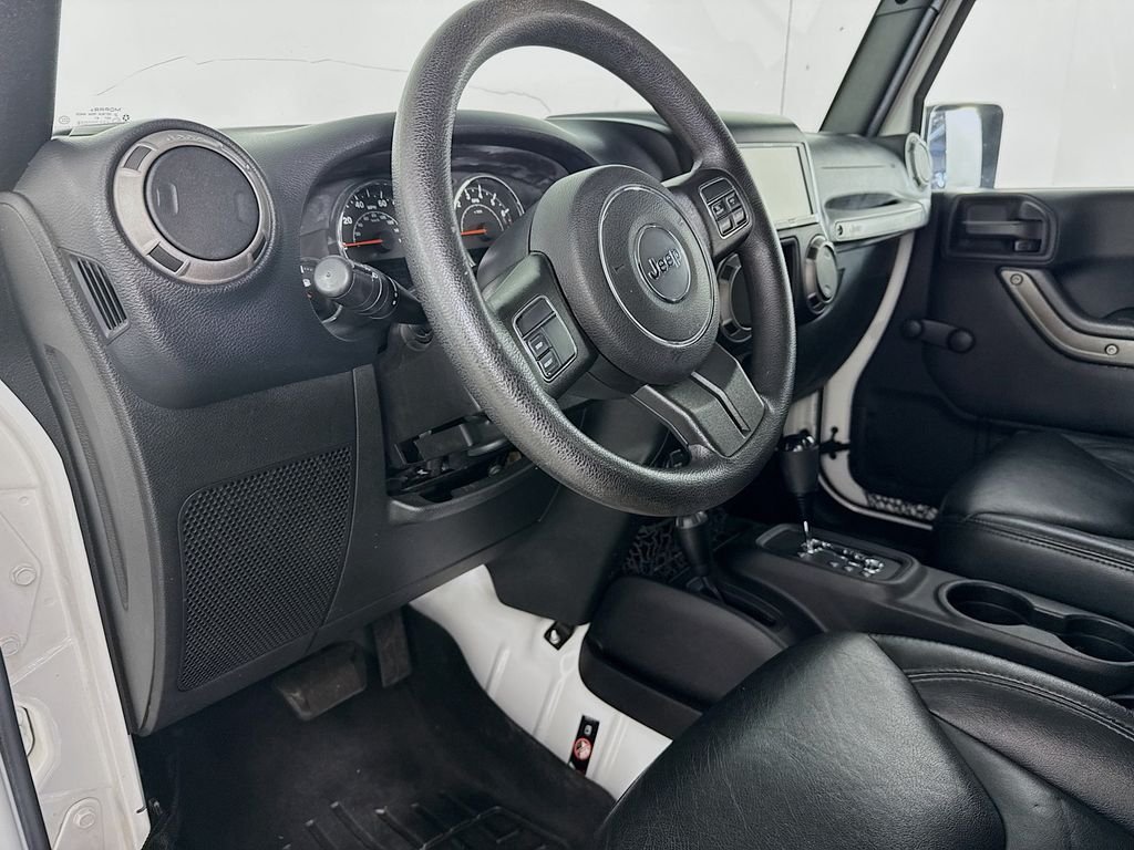 Used 2015 White Jeep Unlimited Sport image 4