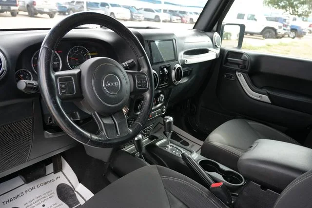 Used 2018 Black Jeep Unlimited Sahara image 10