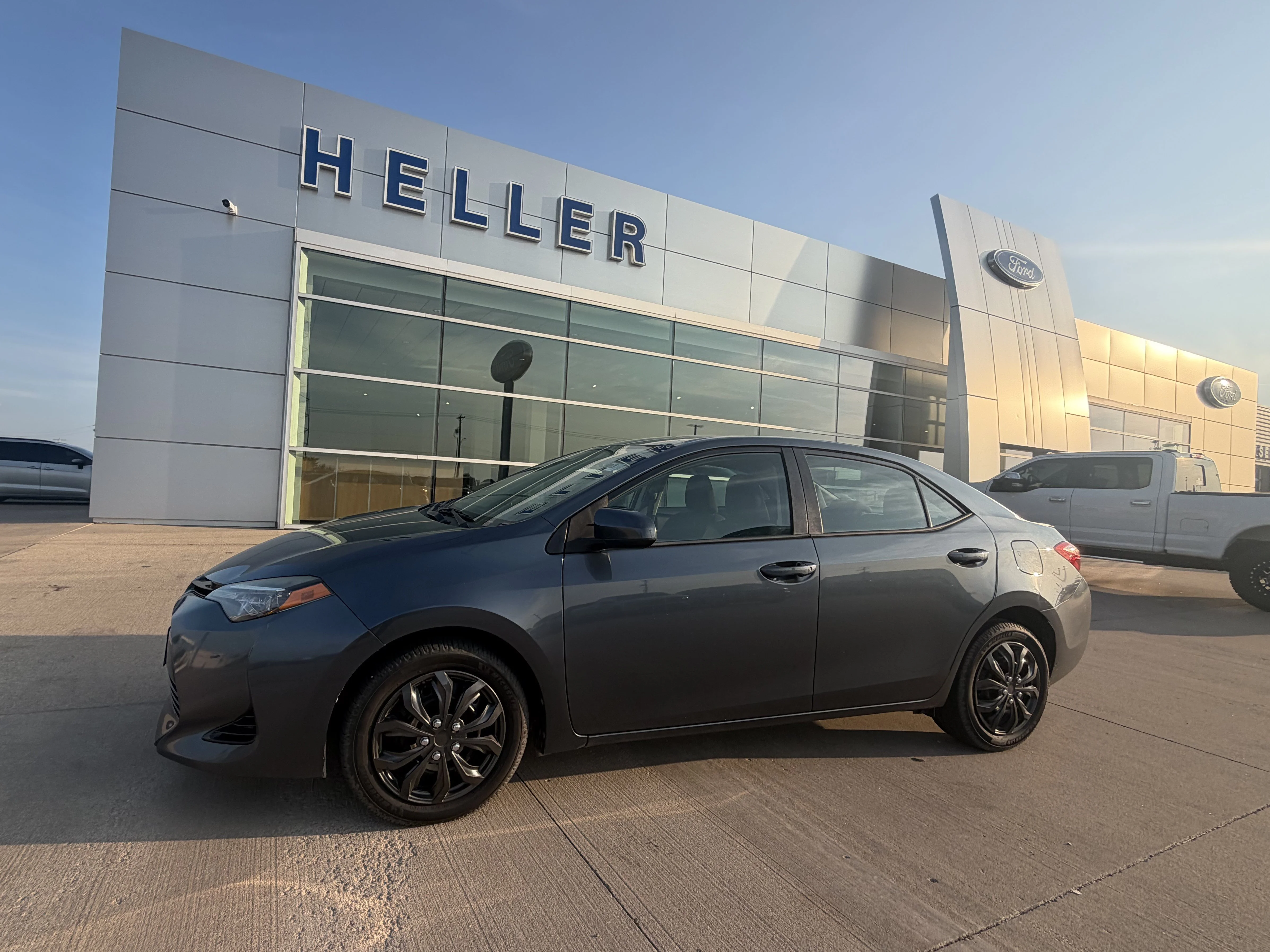 Used 2018 Slate Metallic Toyota LE image 3