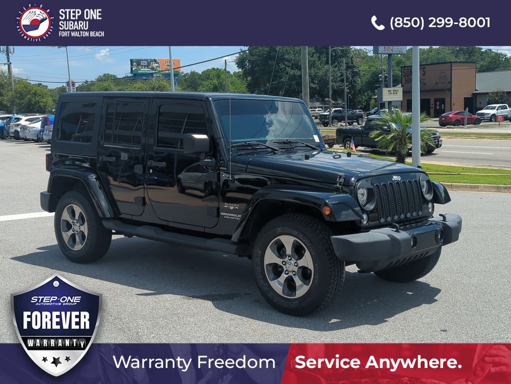 Used 2017 Black Jeep Unlimited Sahara image 9