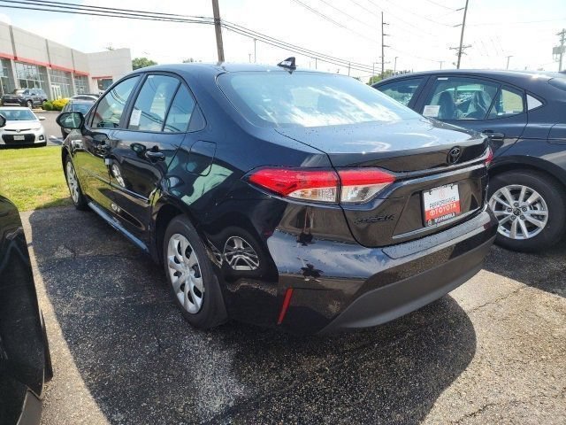 Used 2025 Midnight Black Metallic Toyota LE image 4