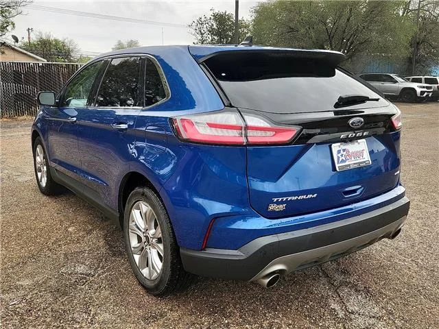 Used 2024 Blue Ford Titanium All-Wheel Drive image 3