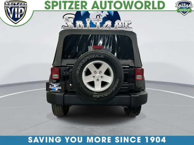 Used 2013 Black Clearcoat Jeep Sport image 9