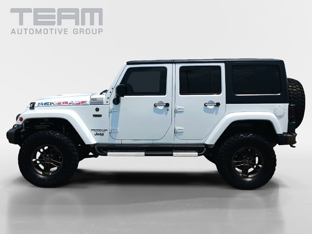 Used 2016 White Jeep Unlimited Sahara image 4