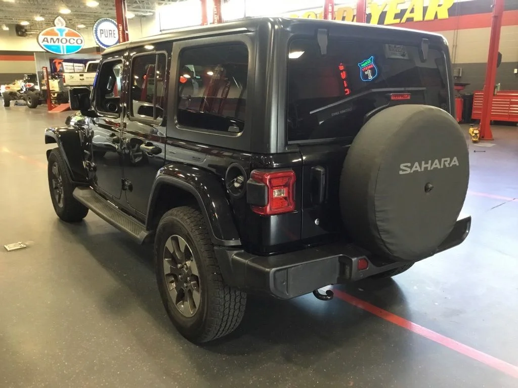 Used 2018 Black Jeep Unlimited Sahara image 4