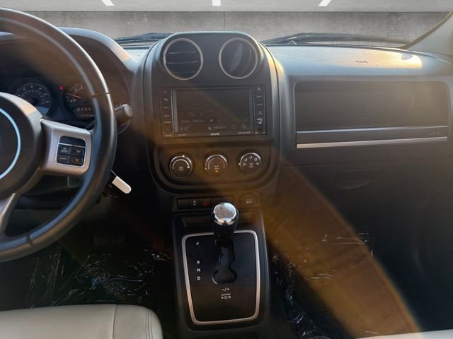 Used 2016 Granite Crystal Clearcoat Metallic Jeep Sport image 4