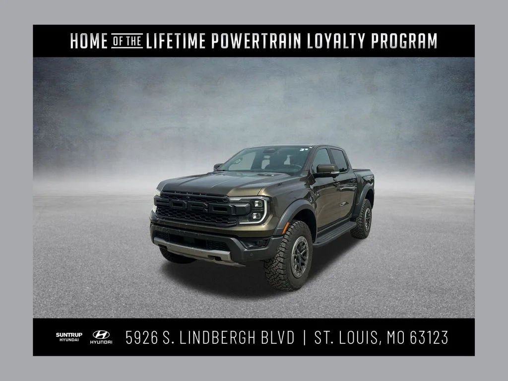 Used 2024 Green Metallic Ford Raptor image 1