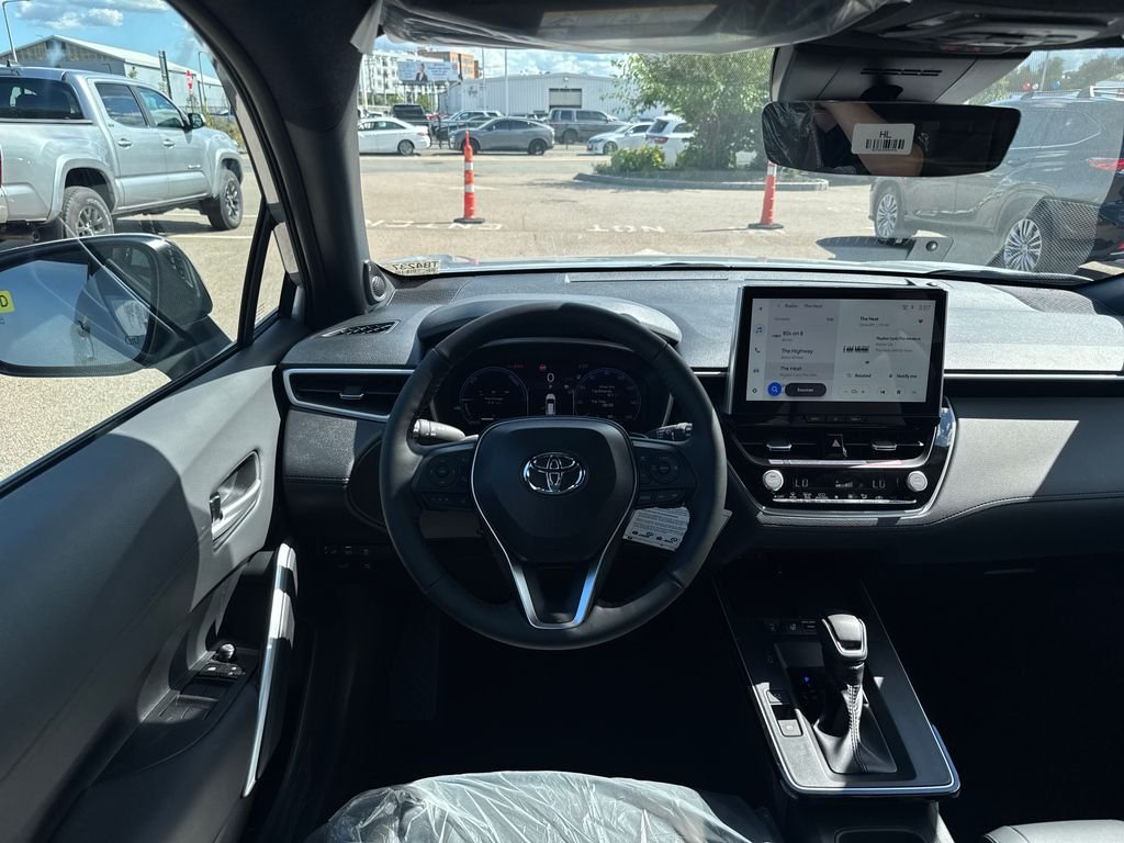New 2026 Silver Toyota Hybrid XSE image 11