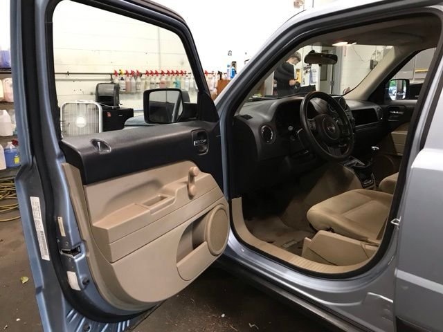 Used 2013 Beige Jeep Sport image 13