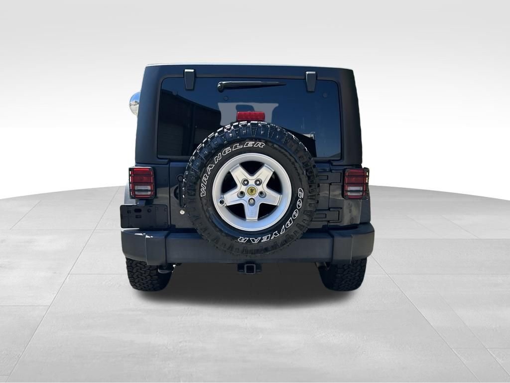 Used 2018 Gray Jeep Unlimited Sport image 4