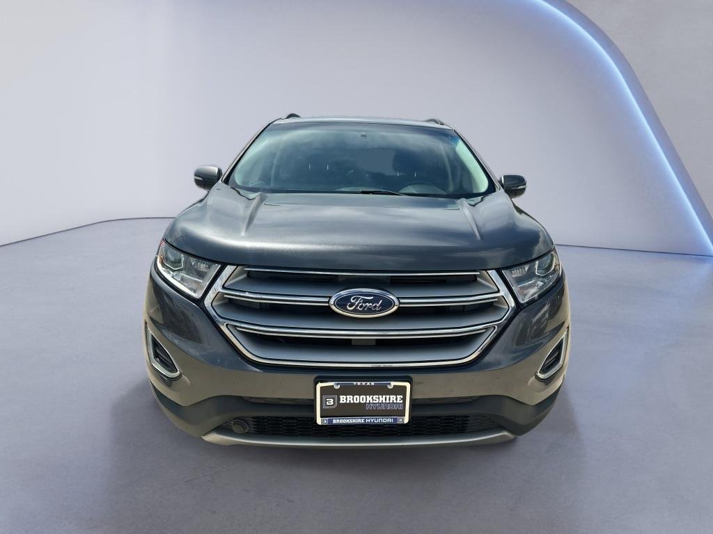 Used 2017 Magnetic Metallic Ford SEL image 2