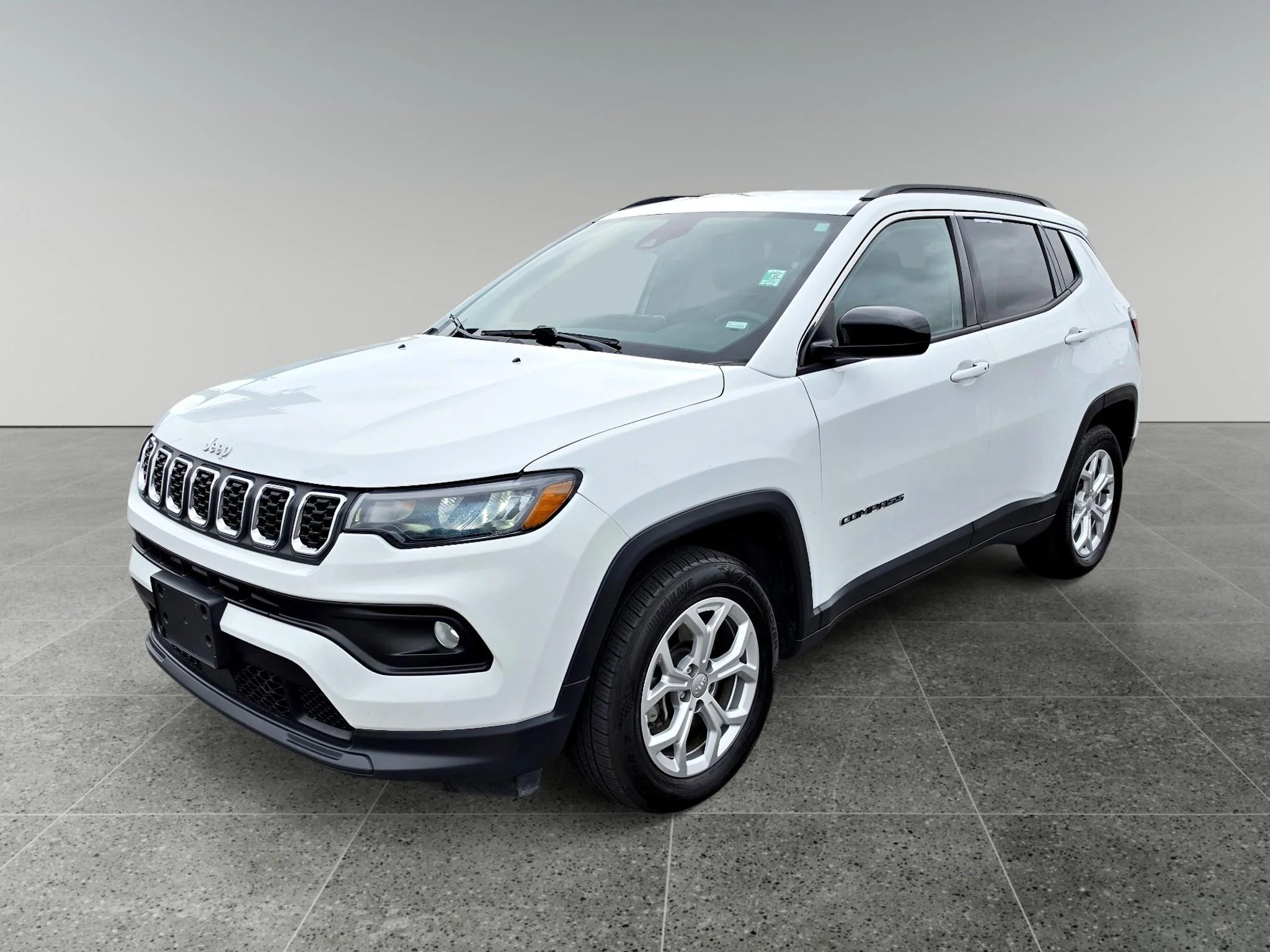 Used 2024 Bright White Clearcoat Jeep Latitude image 1