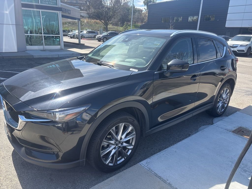 Used 2021 Black Mazda Grand Touring image 1