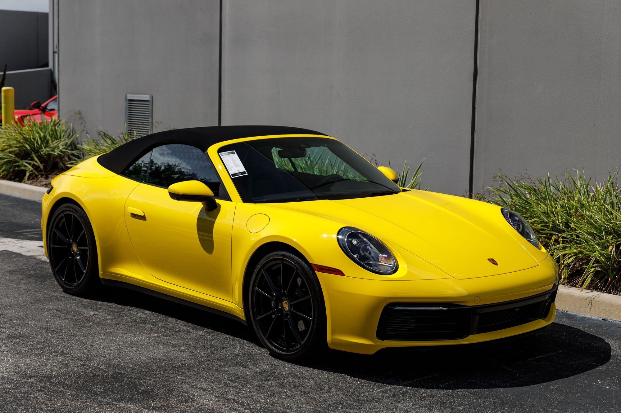 Used 2022 Racing Yellow Porsche Carrera image 3