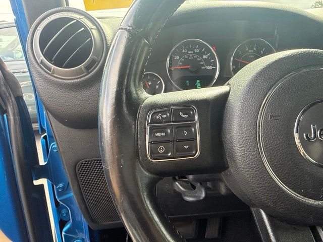 Used 2015 Blue Jeep Unlimited Sport image 13