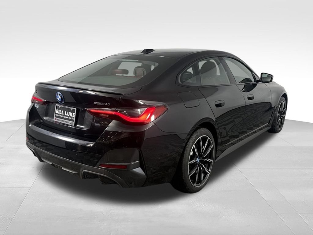 Used 2023 Black Sapphire Metallic BMW eDrive40 image 6