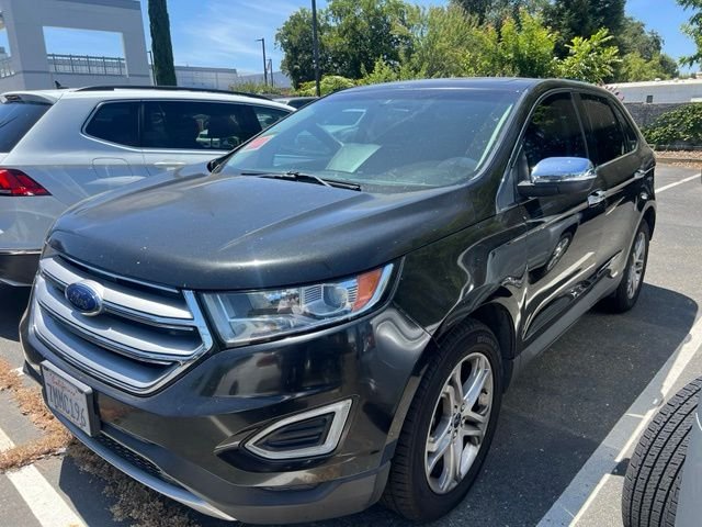 Used 2015 Black Ford Titanium image 1