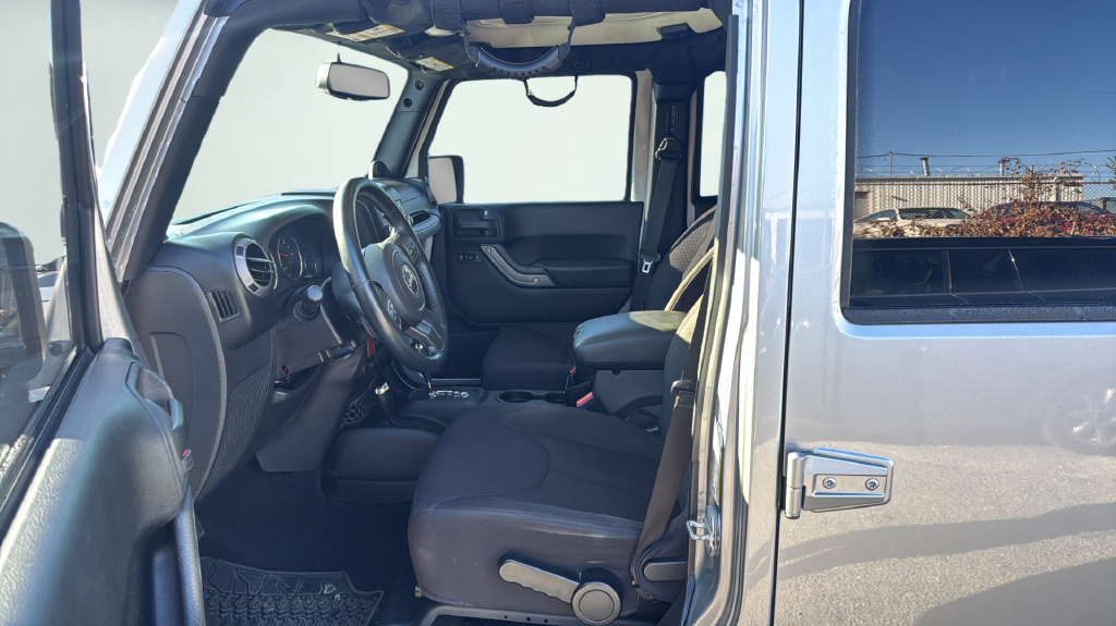 Used 2013 Silver Jeep Unlimited Sport image 16