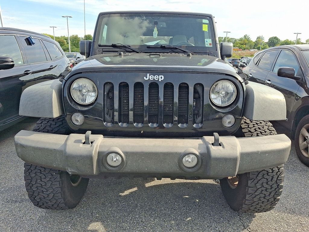 Used 2015 Black Jeep Unlimited Sport image 2
