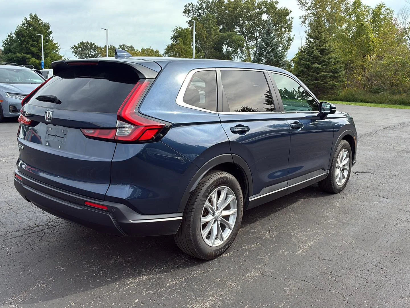 Used 2024 Canyon River Blue Metallic Honda EX-L image 24