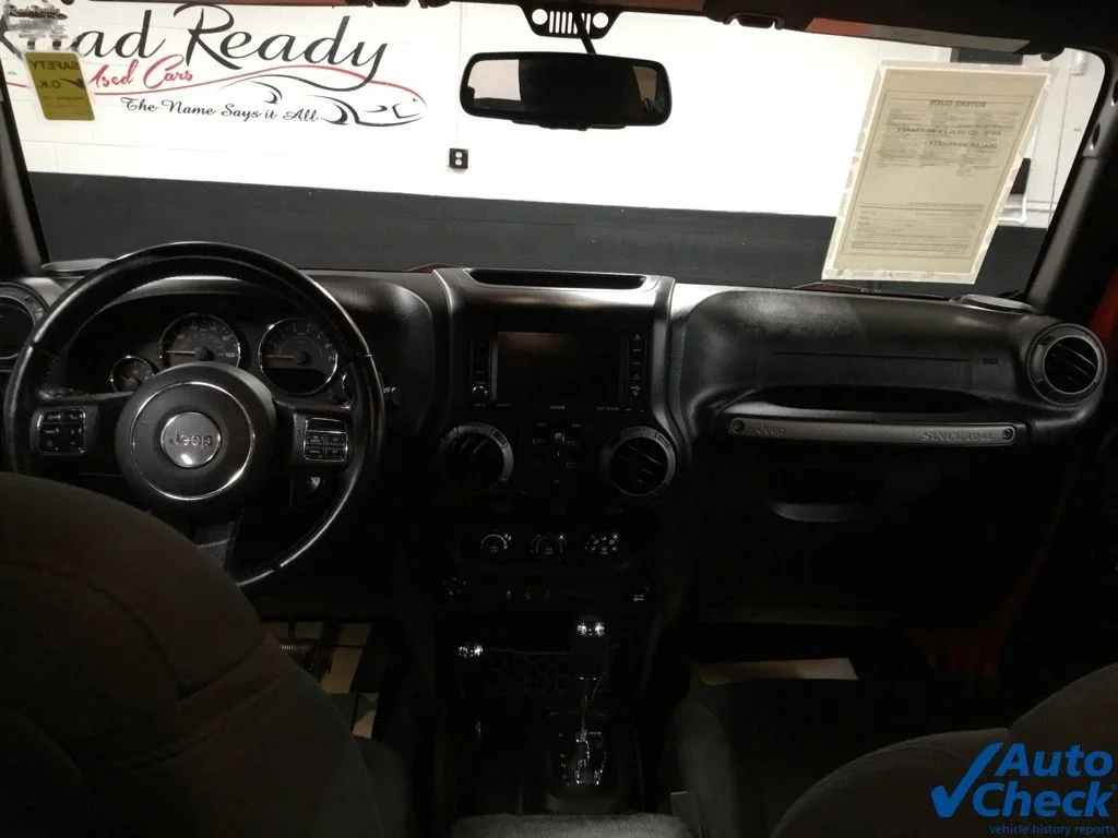 Used 2015 Orange Jeep Unlimited Sport image 28