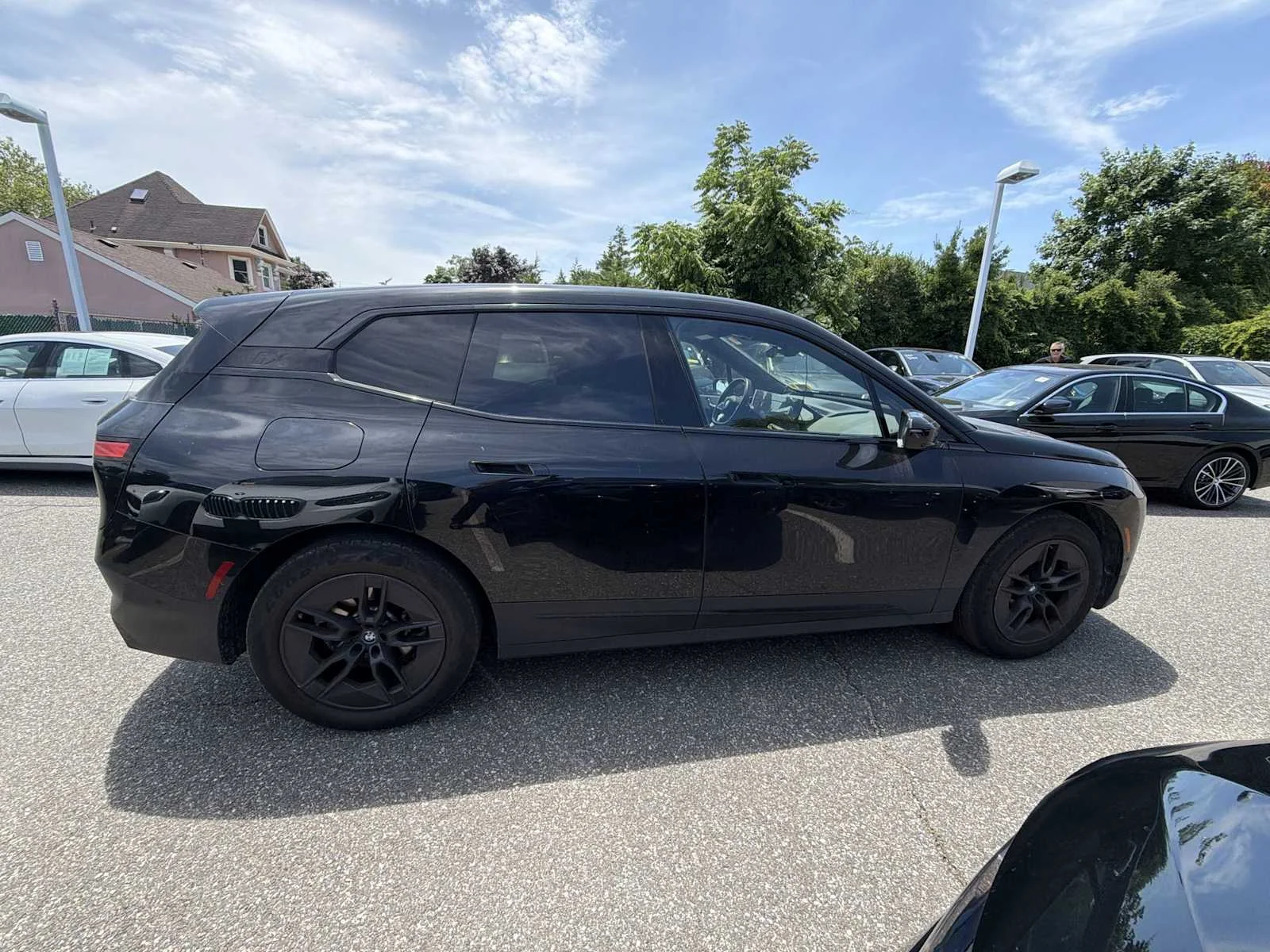 Used 2024 Black Sapphire Metallic BMW xDrive50 image 7
