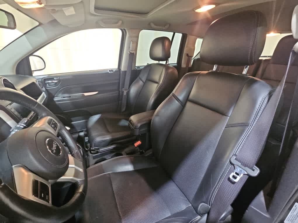 Used 2015 Black Clearcoat Jeep High Altitude Edition image 6