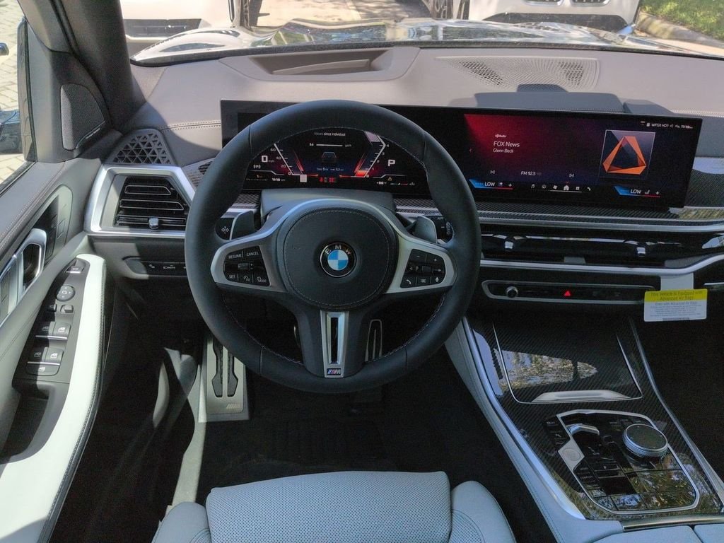 New 2026 Black Sapphire Metallic BMW M60i image 16