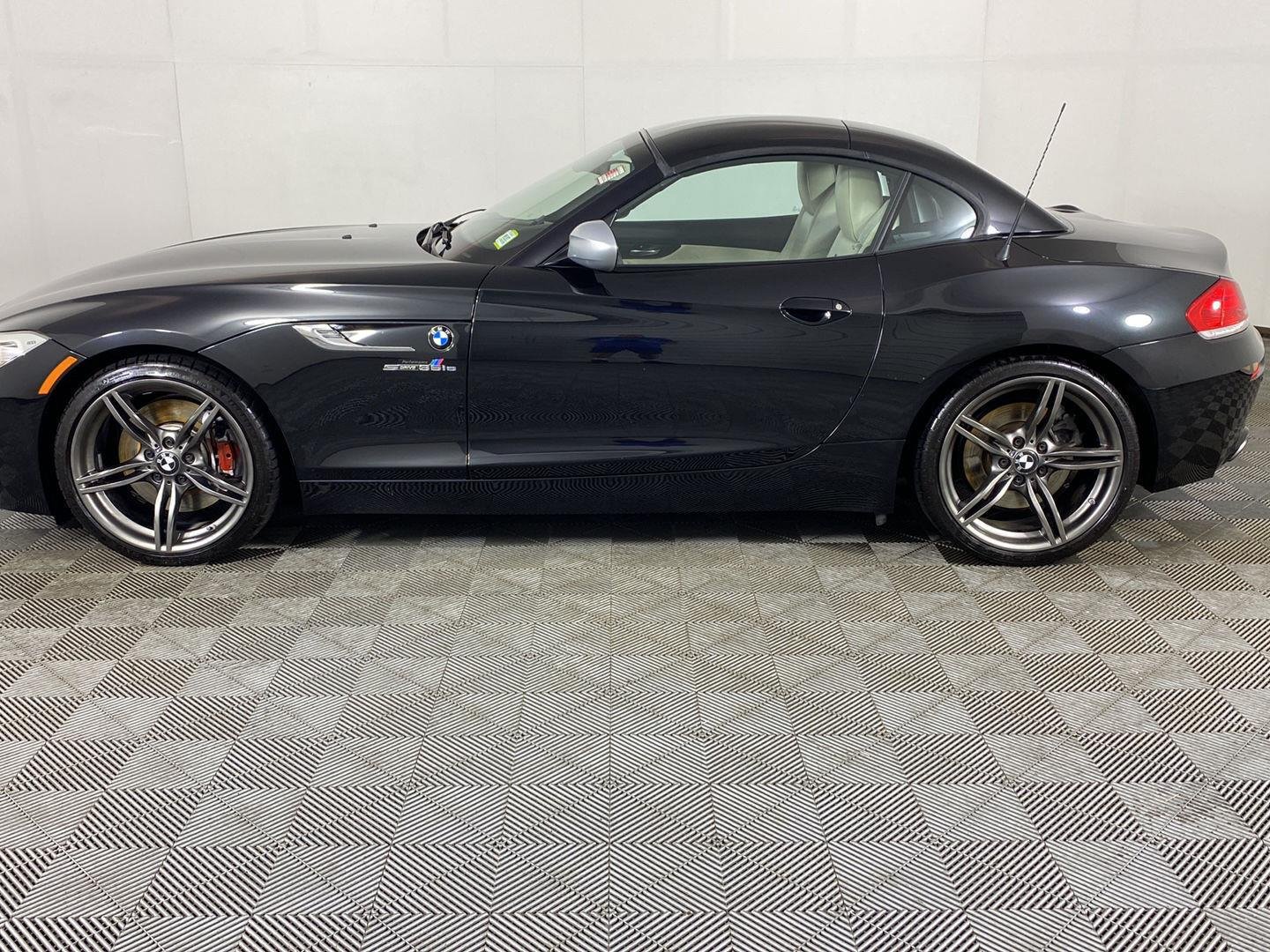 Used 2011 Black Sapphire Metallic BMW sDrive35is image 11