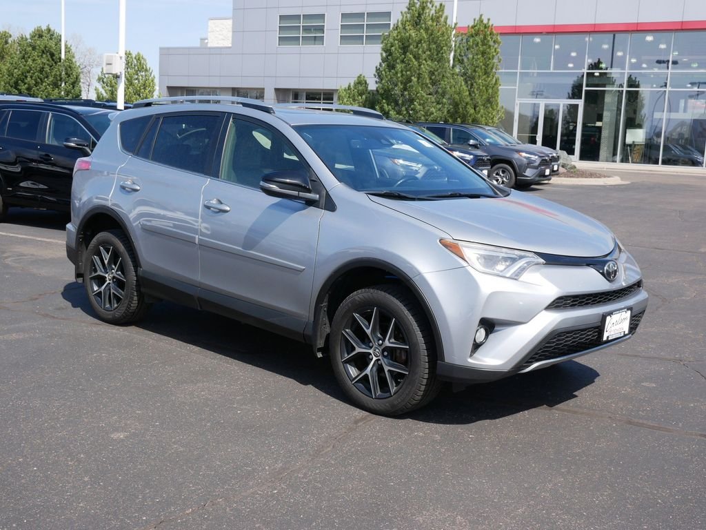 Certified 2018 Toyota RAV4 SE with VIN JTMJFREV0JD241577 for sale in Minneapolis, Minnesota