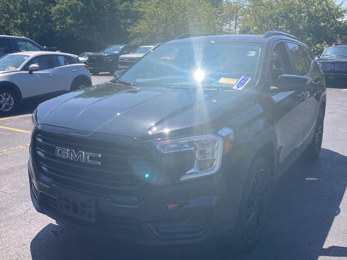 Used 2023 EBONY TWILIGHT METALLIC GMC SLE image 3