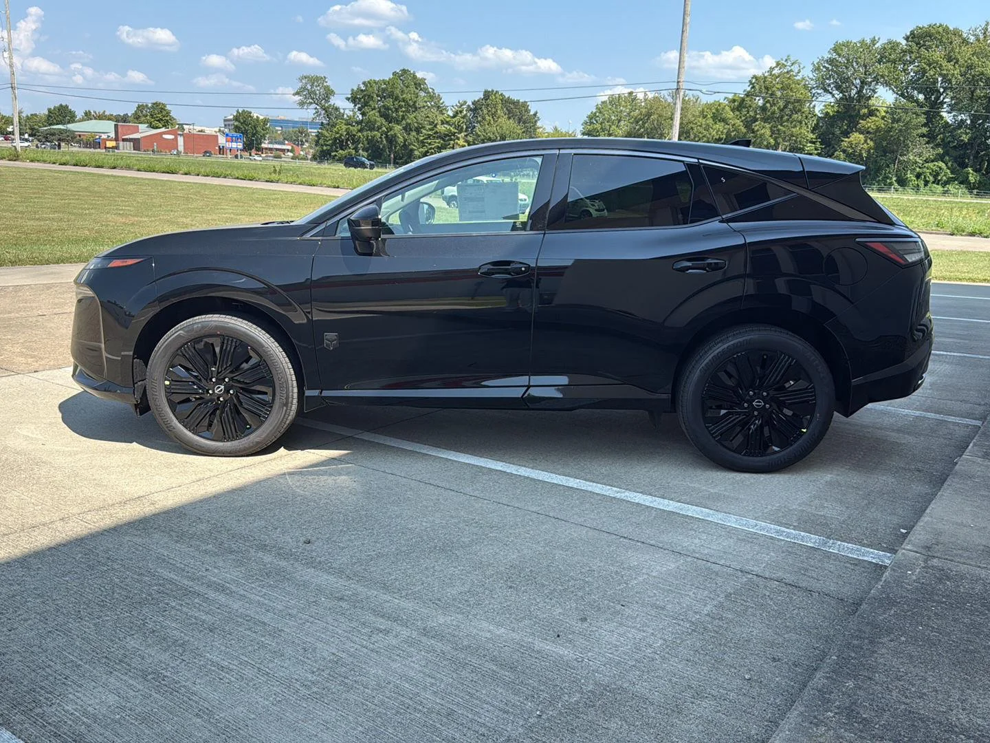 New 2027 Super Black Nissan SL image 4