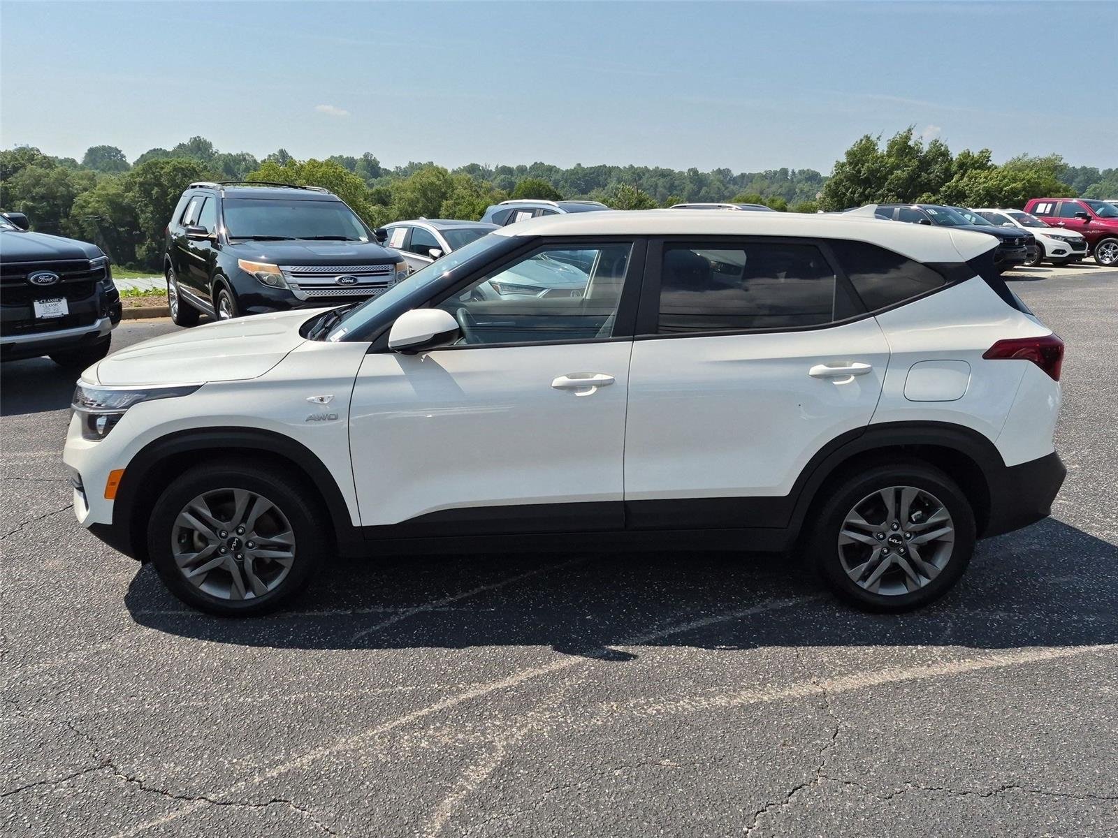 Used 2023 Snow White Pearl Kia LX image 2