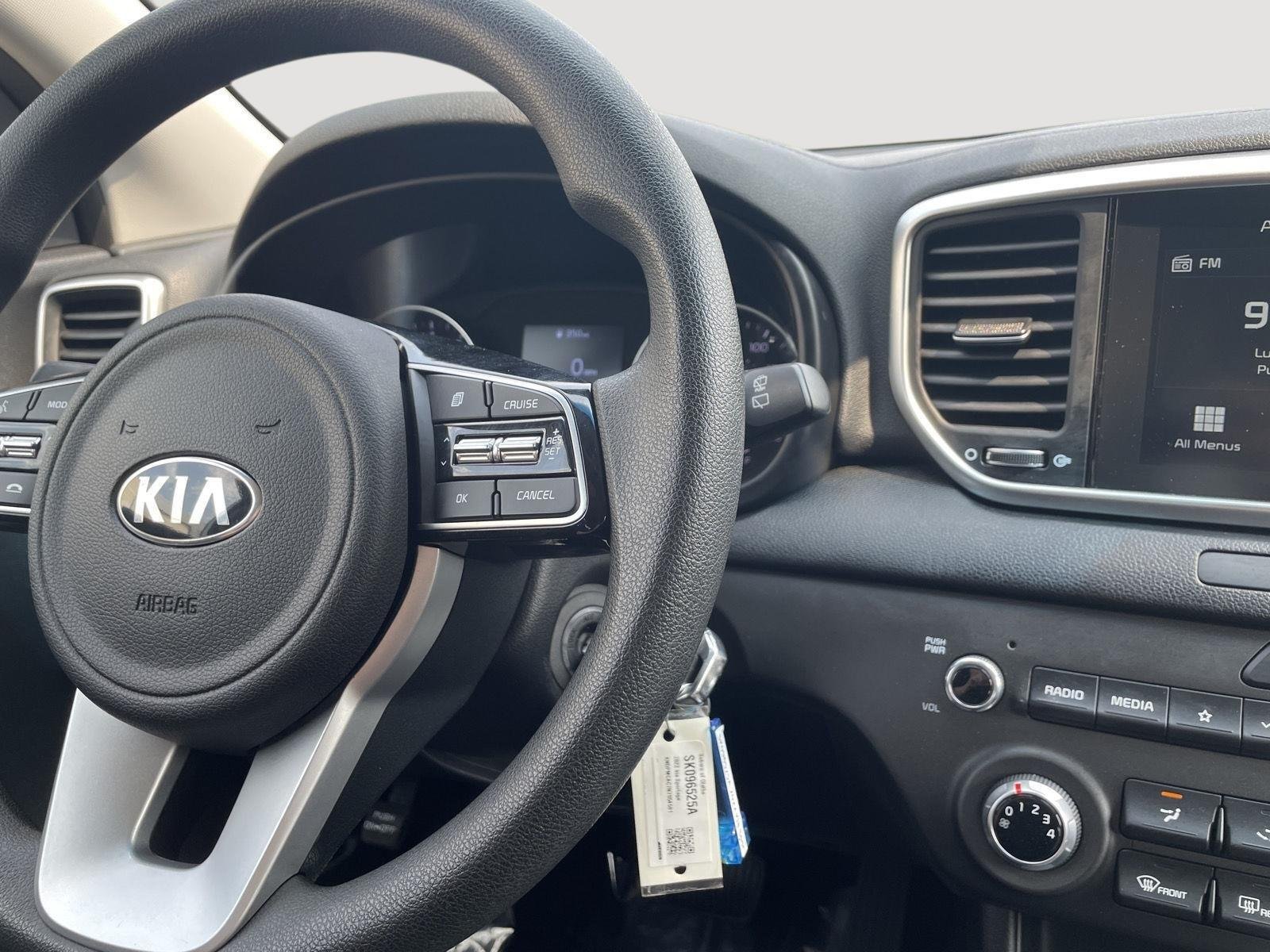 Used 2022 Snow White Pearl Kia LX image 5