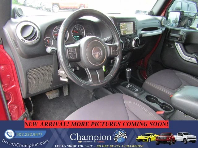 Used 2013 Red Jeep Unlimited Sahara image 11