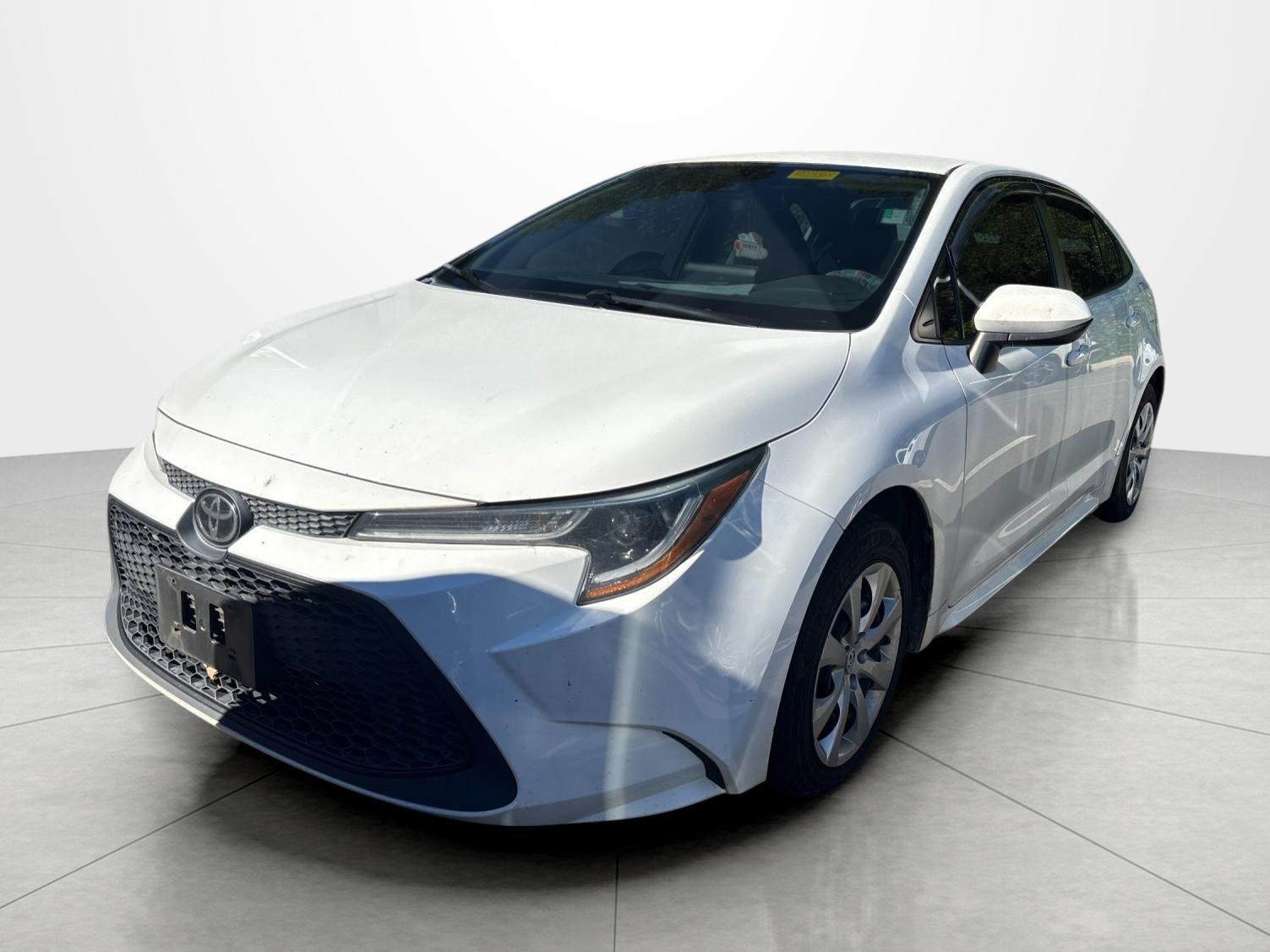 Used 2022 Super White Toyota LE image 1