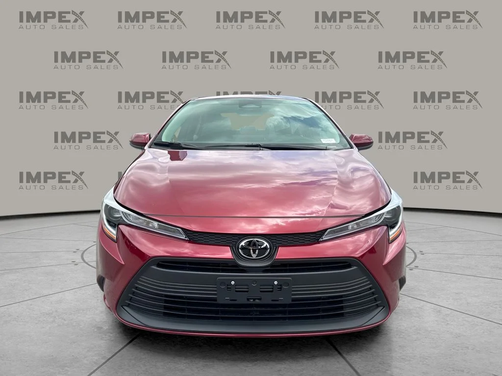 Used 2026 Red Toyota LE image 8